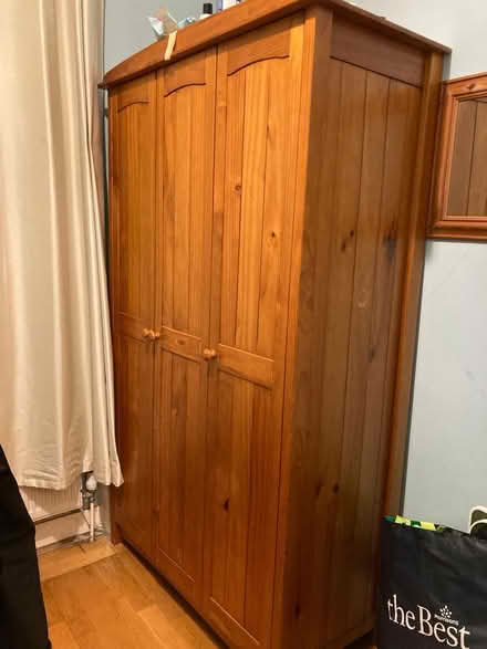 Photo of free 3 door Pine wardrobe (N13 Palmers Green) #1