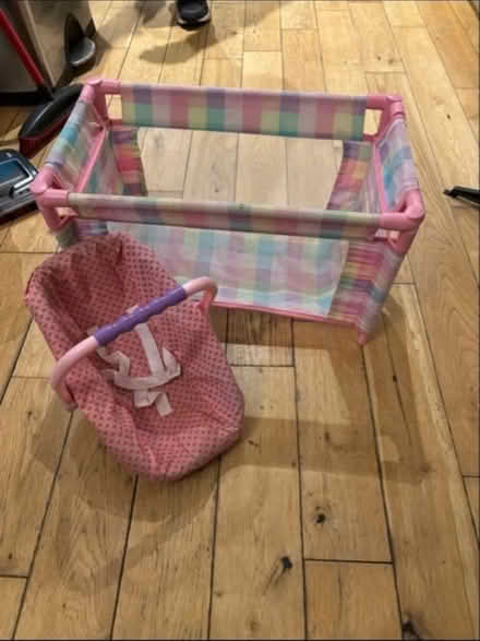 Photo of free Baby doll cot and carrier (Woking GU21) #1