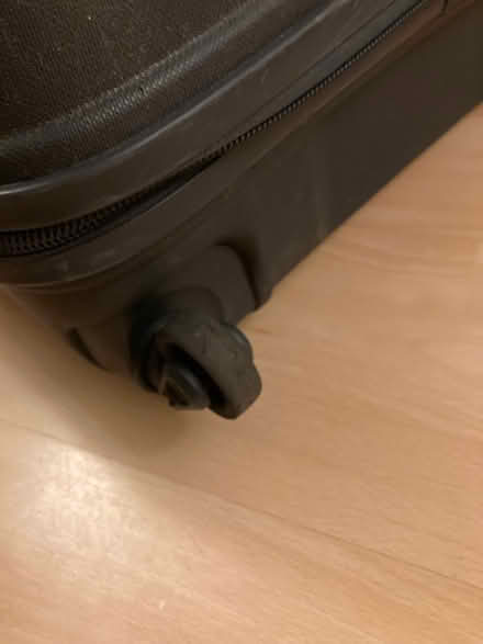 Photo of free Tripp suitcase 1 worn wheel (Southfields SW18) #3