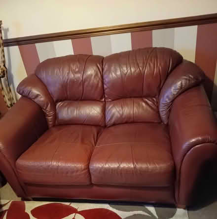 Photo of free Leather burgundy sofa & arm chair (Lowestoft NR32) #1