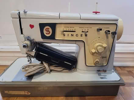 Photo of free singer sewing machine (Warden , Kingston rd area) #1