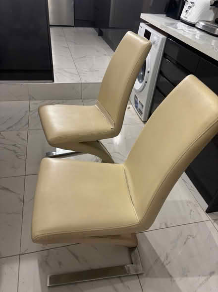 Photo of free Glass table and 4 chairs (TN26) #1