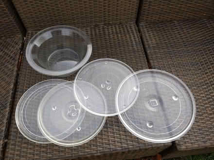 Photo of free Assorted microwave glass turntables plus a washing machine glass (Gorse Hill GU22) #1