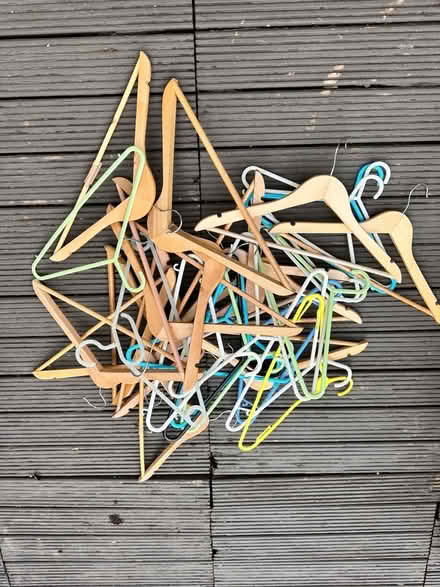 Photo of free Selection of wooden & plastic adult coat hangers (Colchester CO4) #1