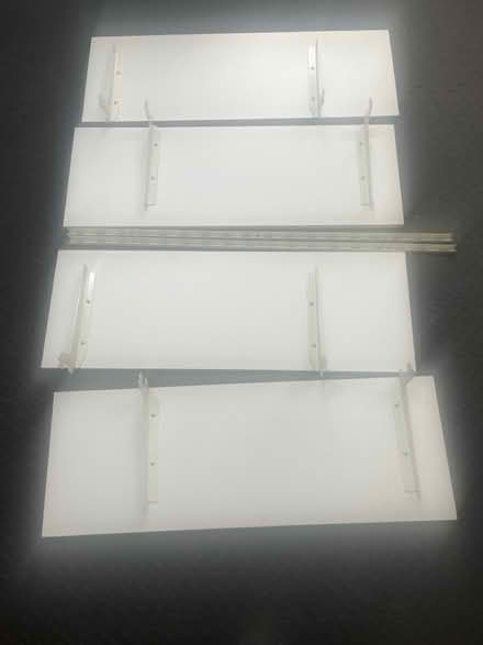 Photo of free Shelves White X4 plus 2 brackets (Thurnby Leicester LE7) #1