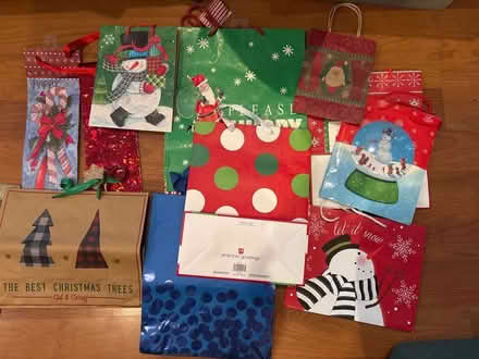 Photo of free Gently used Christmas bags+bows (Columbia, MD) #1