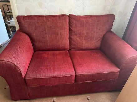 Photo of free Two seater red sofa (Denholme) #1