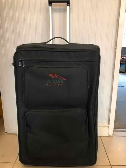 Photo of free V large black suitcase (130 litre) (Clapham Common SW4) #1