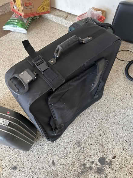 Photo of free Suitcases (Maple Lawn) #2
