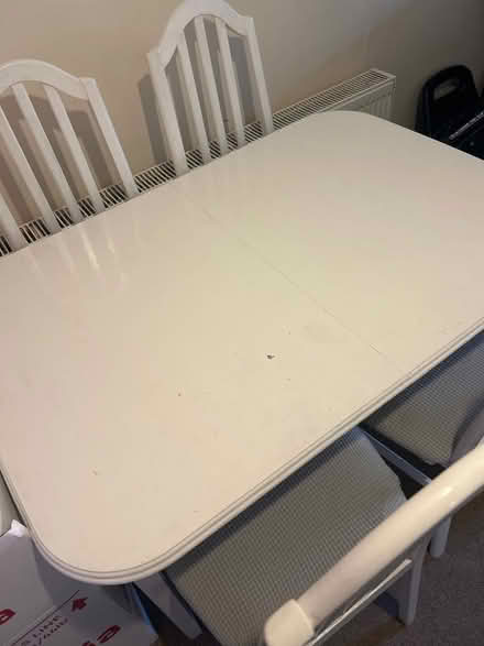 Photo of free Extendable table with 4 chairs (PO10 7TW) #1