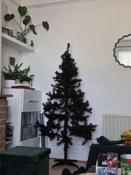 Photo of free Well loved black Christmas tree (TN34) #2