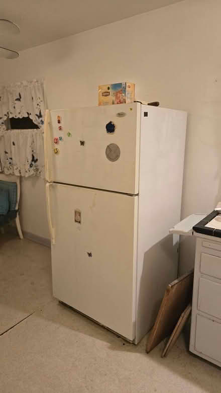 Photo of free Refrigerator with top freezer (Parkway Drive, El Monte.) #1