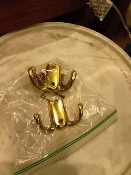 Photo of free Four brass-tone wall hooks (Dalston E8) #2