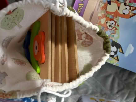 Photo of free Bag of small wooden puzzles (Drexel Hill) #1