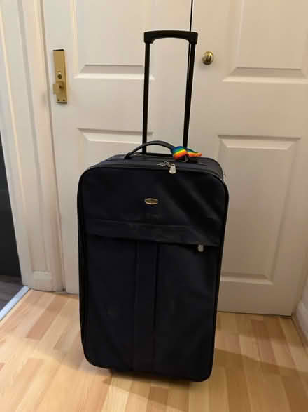 Photo of free Large canvas navy suitcase (Puckeridge SG11) #1
