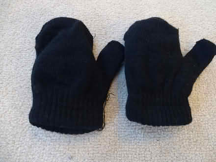 Photo of free baby's black woolly mittens (Tolworth KT5) #1