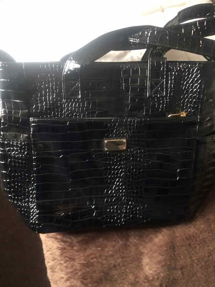 Photo of free One black handbag and one flowery tote bag (Little Neston CH64) #1