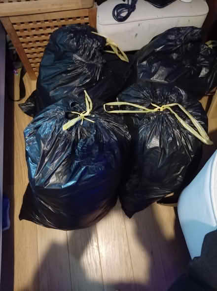 Photo of free 4 black bags of clothes (Eastbourne) #1