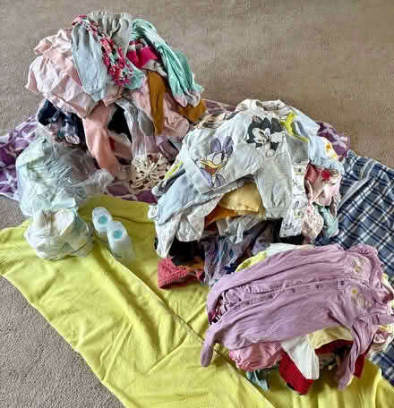Photo of free 0-12 mos baby girl clothes (S Garland St and W Yale Ave) #1
