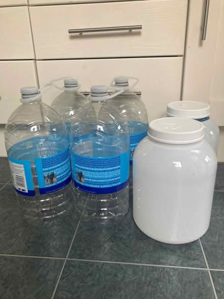 Photo of free empty clean storage tubs and empty 5 litre water bottles (Woodley RG5) #1