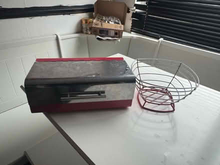Photo of free Bread bin. Fruit ball (Redhill) #1
