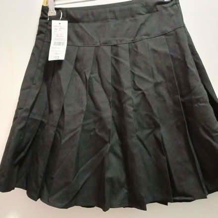 Photo of free 2 black pleated school skirts.. (Sydenham SE26) #1