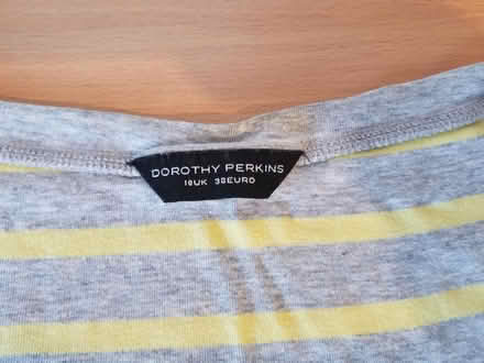 Photo of free Grey yellow striped top size 10 (Gloucester) #2