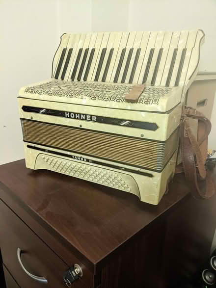 Photo of free Piano accordian (Throop) #1
