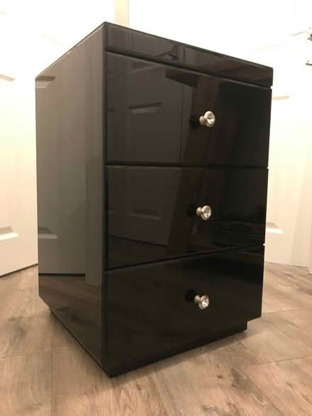 Photo of free Bedside cabinet, black glass covered frame and drawer fronts (Shotgate SS11) #1