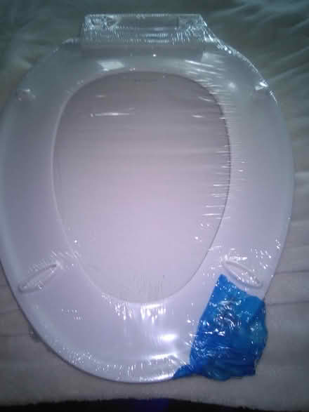 Photo of free New Elongated toilet seat (60th cedar ave 19143) #2