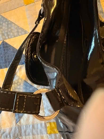 Photo of free Small shiny black rosette bag (Drexel Hill) #2