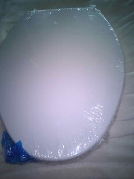 Photo of free New Elongated toilet seat (60th cedar ave 19143) #3