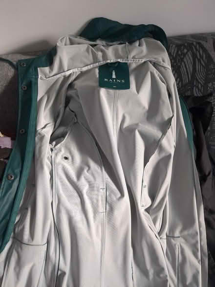 Photo of free Rains green raincoat XS (Bethnal Green E2) #1