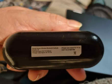 Photo of free Blue tooth ear bud in case. (HA0) #3