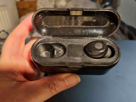 Photo of free Blue tooth ear bud in case. (HA0) #1