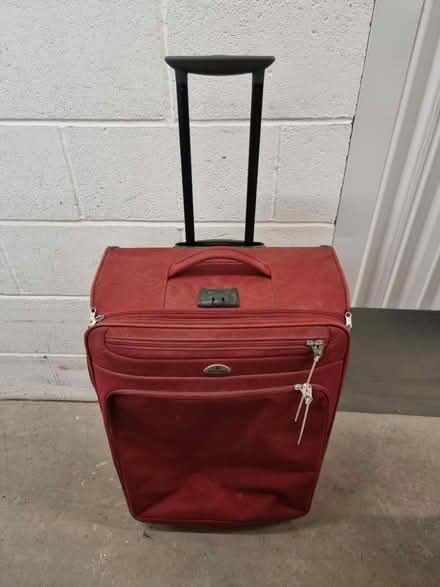 Photo of free Red Samsonite softshell suitcase (SW11 3SJ) #1