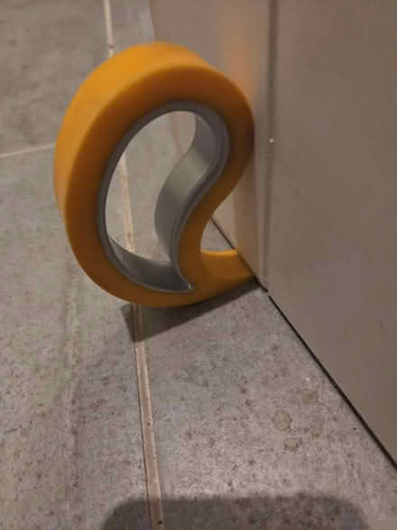Photo of free Orange and Silver Rubber Doorstop (Prestwich M25) #2