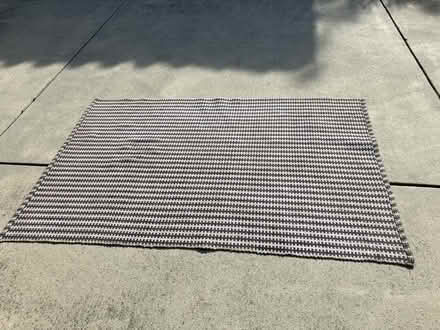 Photo of free Outdoor checkered rug 35x68” (Northeast Morgan Hill) #1