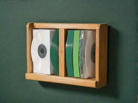 Photo of free Wooden cd rack (Moss Side PR25) #1