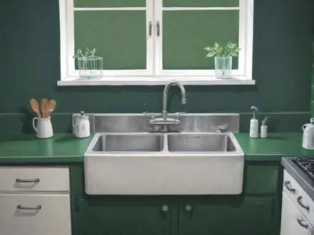 Photo of a kitchen with stainless steel sink and taps (Wreay CA4) #1