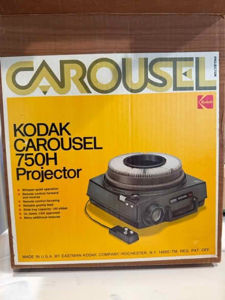 Photo of free Slide carousels and projector (95117) #1