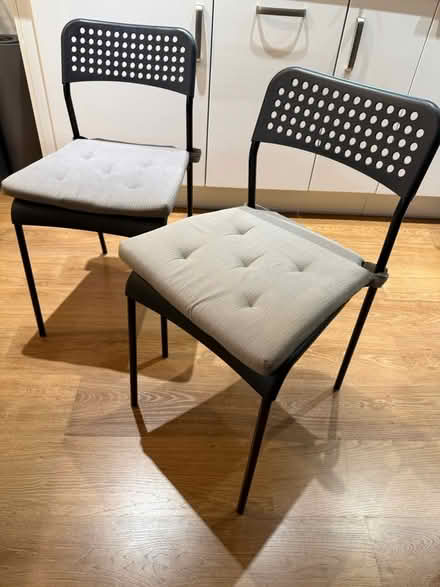 Photo of free 2 x black plastic chairs (Seven Sisters N15) #1