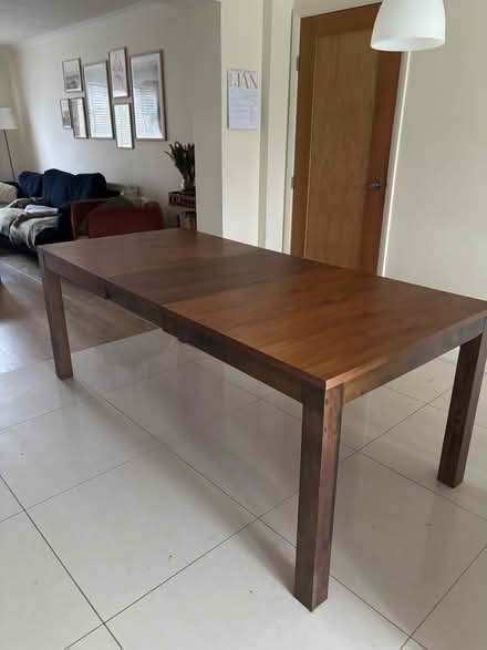 Photo of free Dark wood dining table (OX13 Marcham) #1