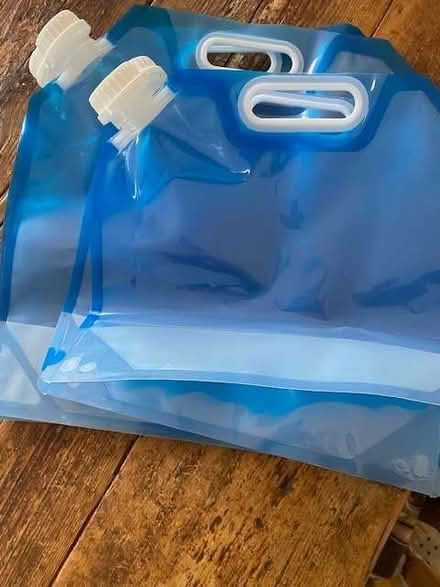 Photo of free 4 flat plastic bottles to store water - for camping? (CT11) #1