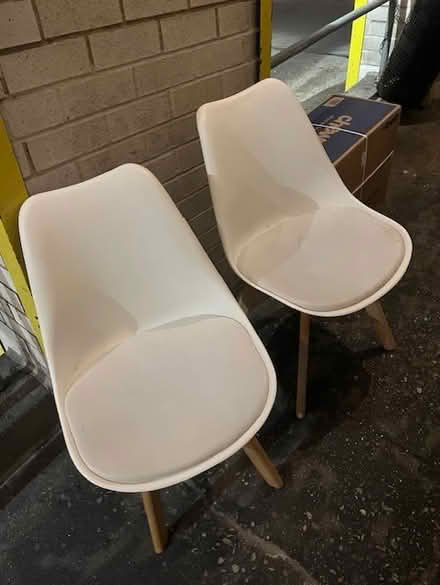 Photo of free Curb alert: White plastic chairs (Upper East Side) #1
