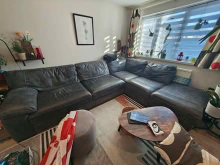 Photo of free Grey/black leather sofa (Pennyland MK15) #1