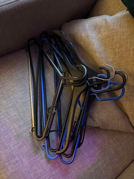 Photo of free 11 plastic coat hangars (Limehouse E1) #1