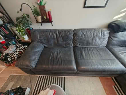 Photo of free Grey/black leather sofa (Pennyland MK15) #2