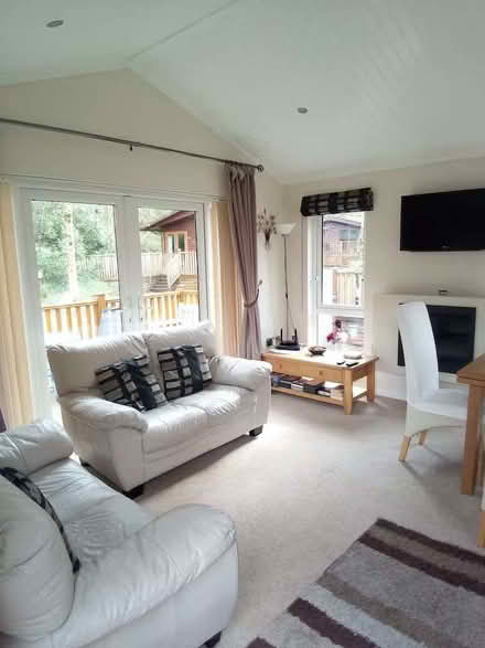 Photo of free 2 cream leather two-seater sofas and four dining table chair (Blencarn CA10) #3