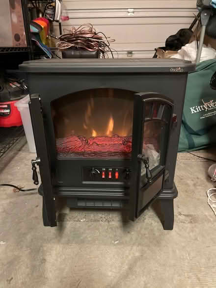 Photo of free Electric Space Heater “Fire” Place (Corvina Court) #1